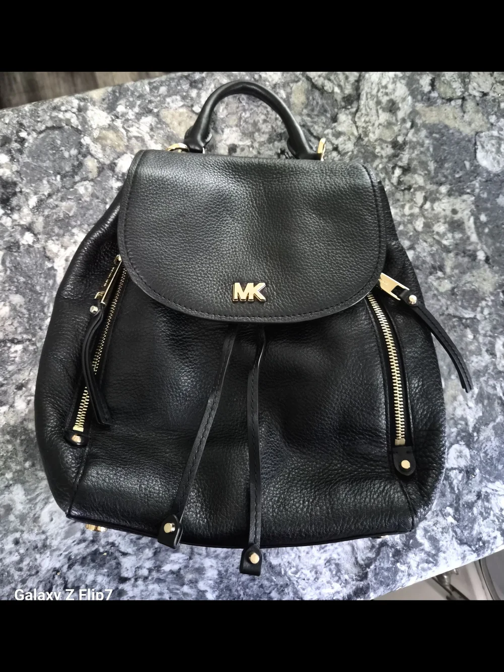 Michael Kors Black Pebbled Leather Backpack with Gold MK Logo